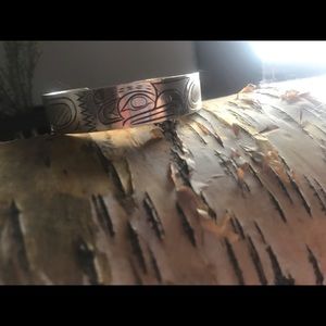 Indigenous BC carved silver eagle bracelet